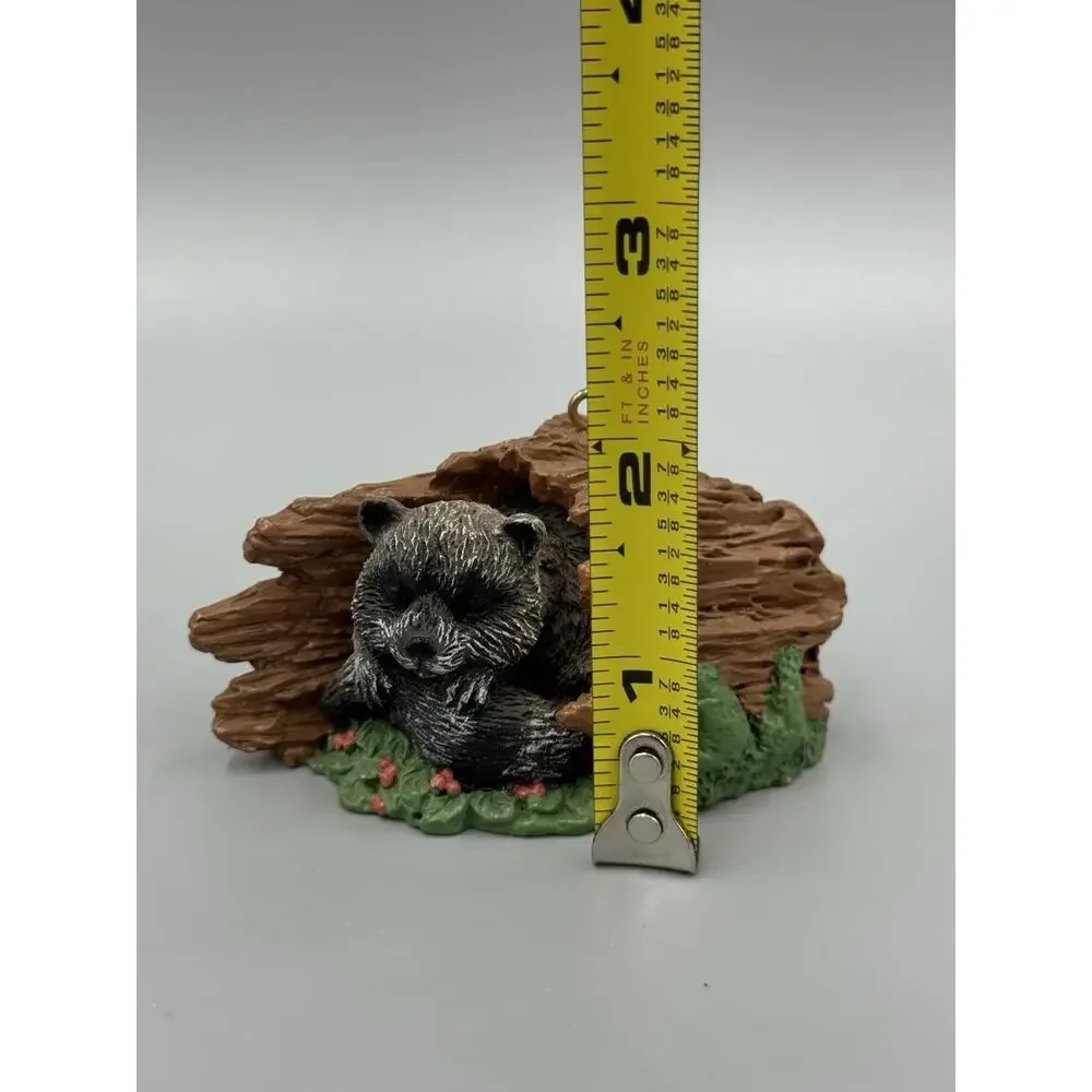 Vintage 1994 Sleeping Raccoon Log Resin Woodland Animal Ornament DCI 3” Long